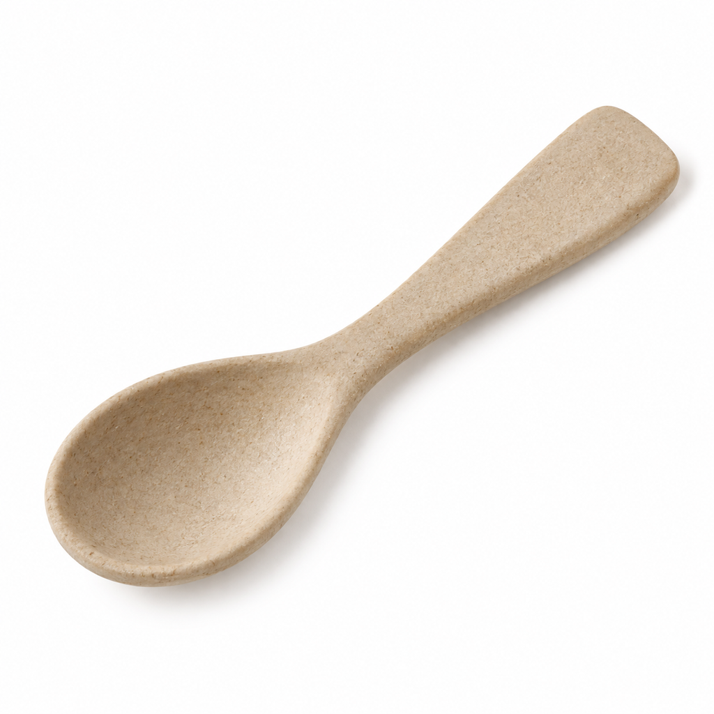 Eco-friendly wheat straw spoon in natural beige.