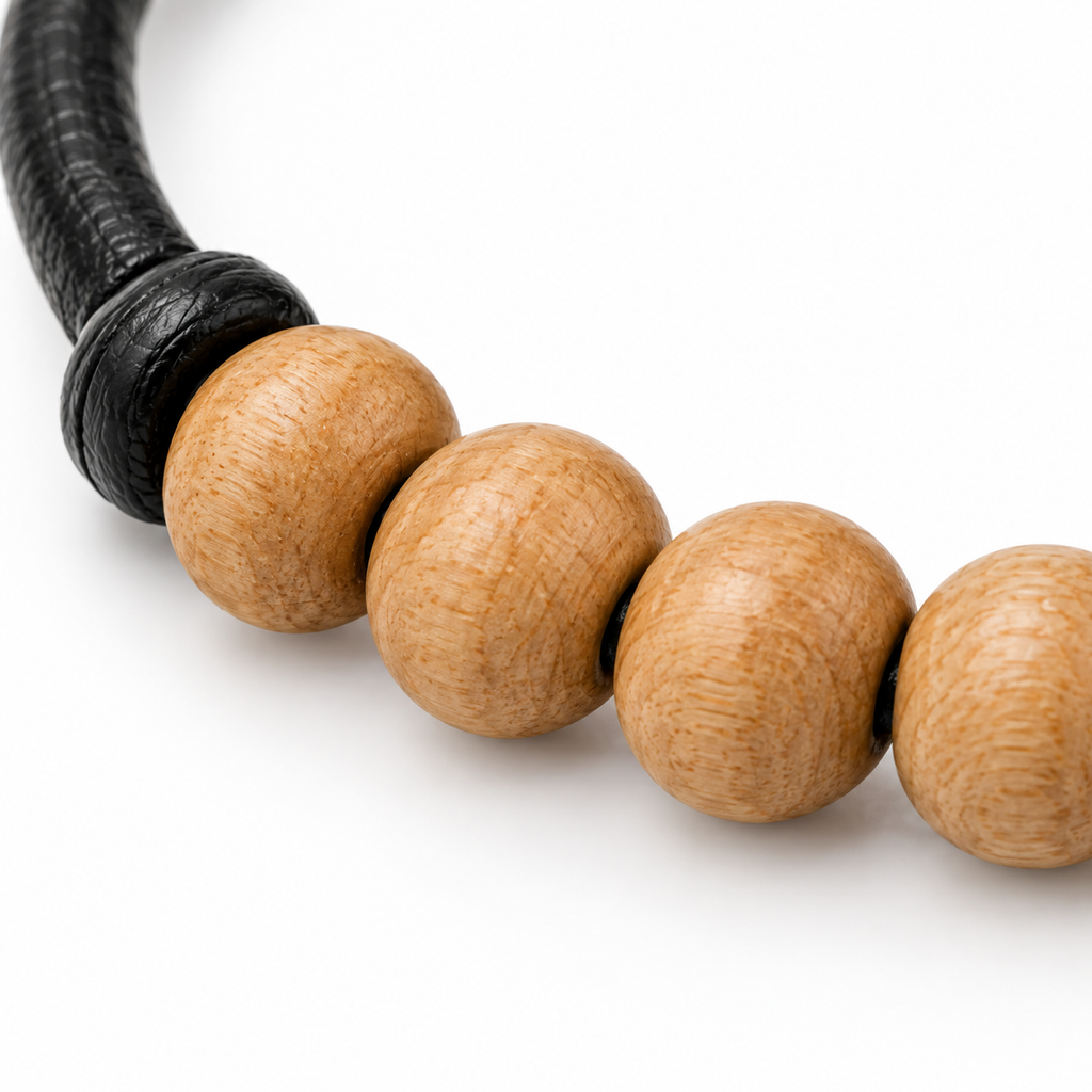 Elegant bracelet with leather and wood design.