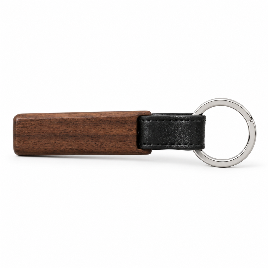 Close-up of metal ring on wooden keychain.
