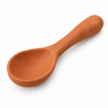 Handmade terracotta serving spoon with natural finish