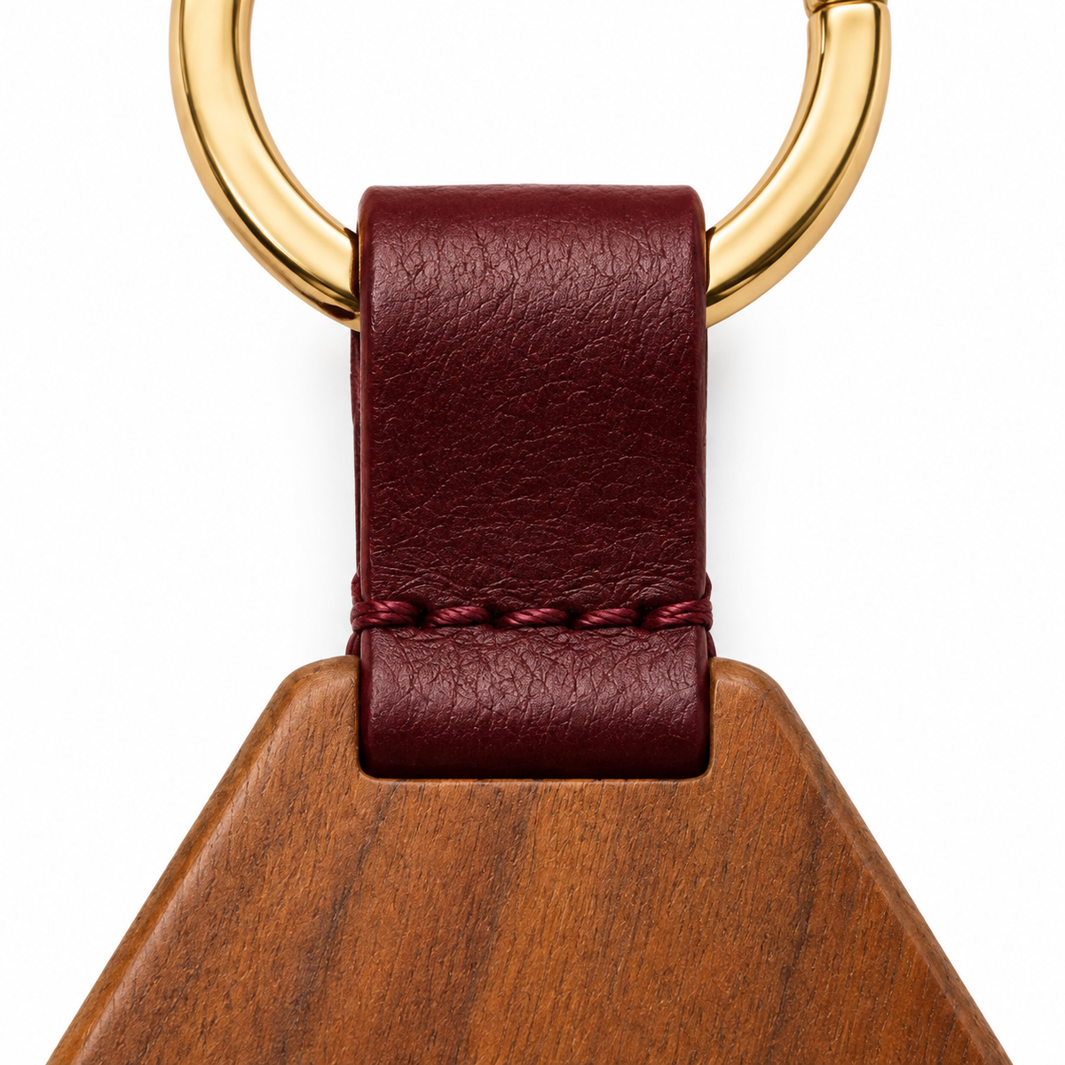 Elegant wooden keychain with hexagonal design.