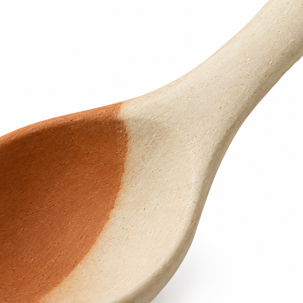 Top view of the handmade ceramic cooking spoon.