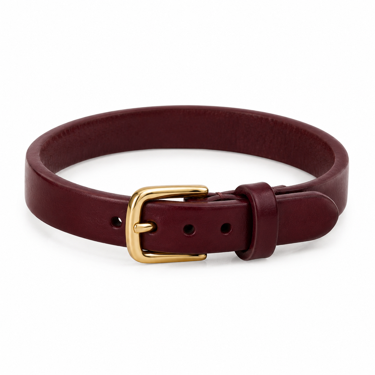 Burgundy leather bracelet with gold buckle, laid flat