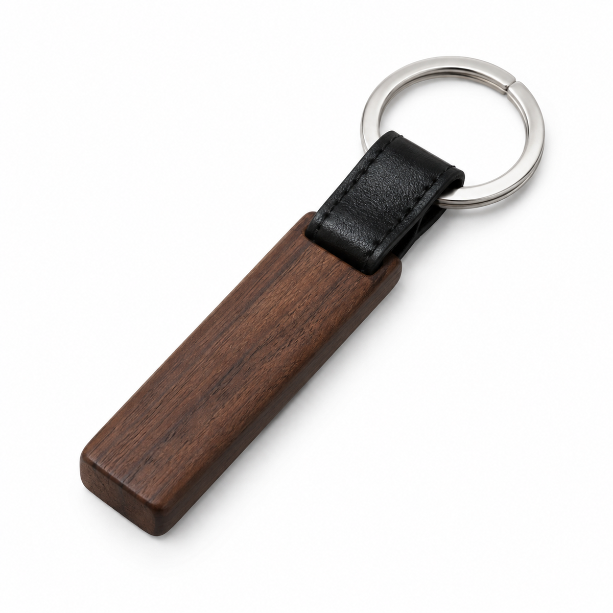 Wooden keychain with leather strap and metal ring.