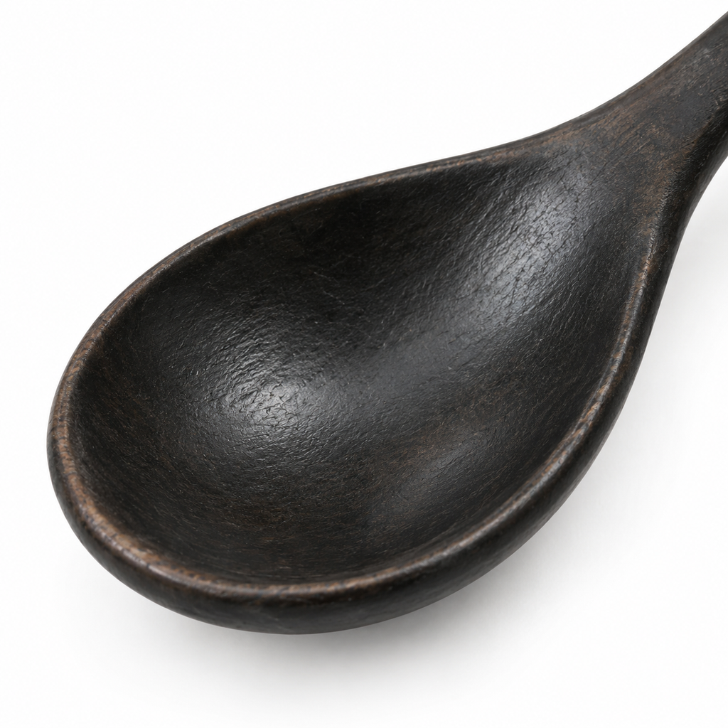 Black finish wooden spoon for elegant kitchens.
