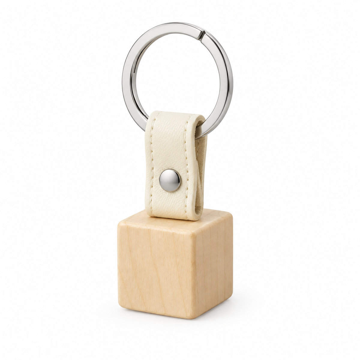 Front view of wooden keychain with leather strap and metal ring.