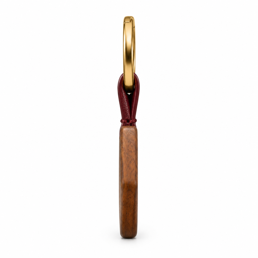 Keychain showing leather strap and gold ring.