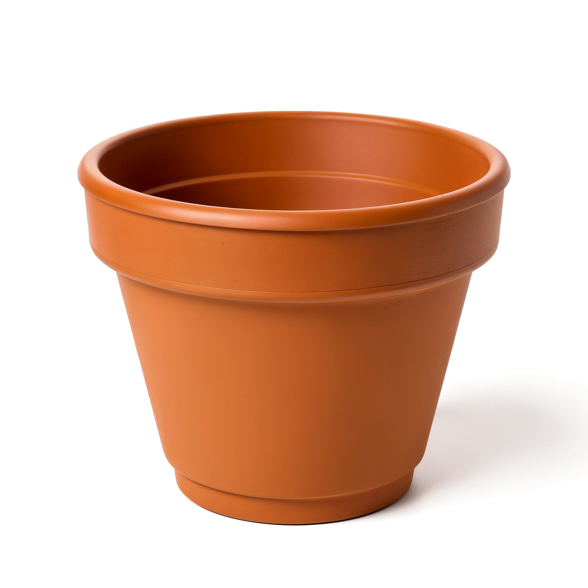 Vensioshop Small Terracotta Pot — side profile showing the pot's silhouette and smooth terracotta finish