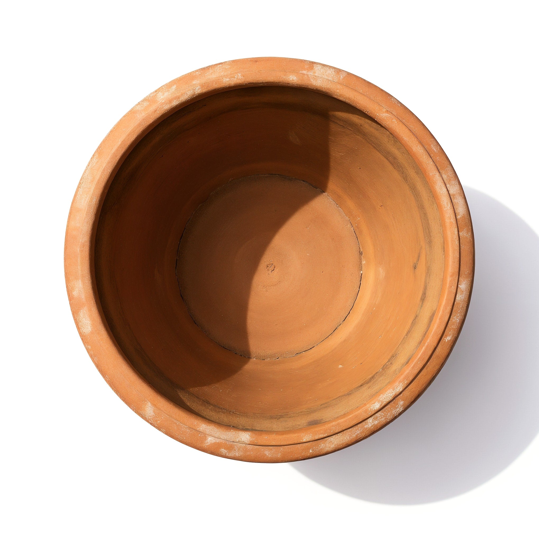 Large Rustic Italian Terracotta Planter — top-down view into the empty planter, showing the interior.