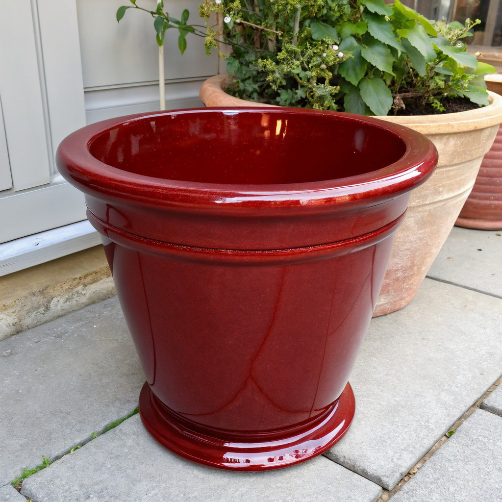 Vensioshop Ruby Red Ceramic Planter — Hero front view showcasing the glossy finish and classic pot shape.