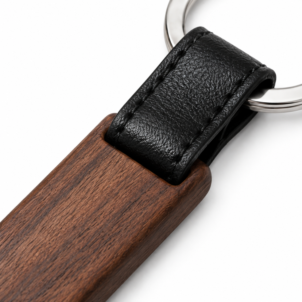 Elegant wooden keychain with durable leather strap.