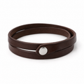 Brown leather wrap bracelet with snap closure.