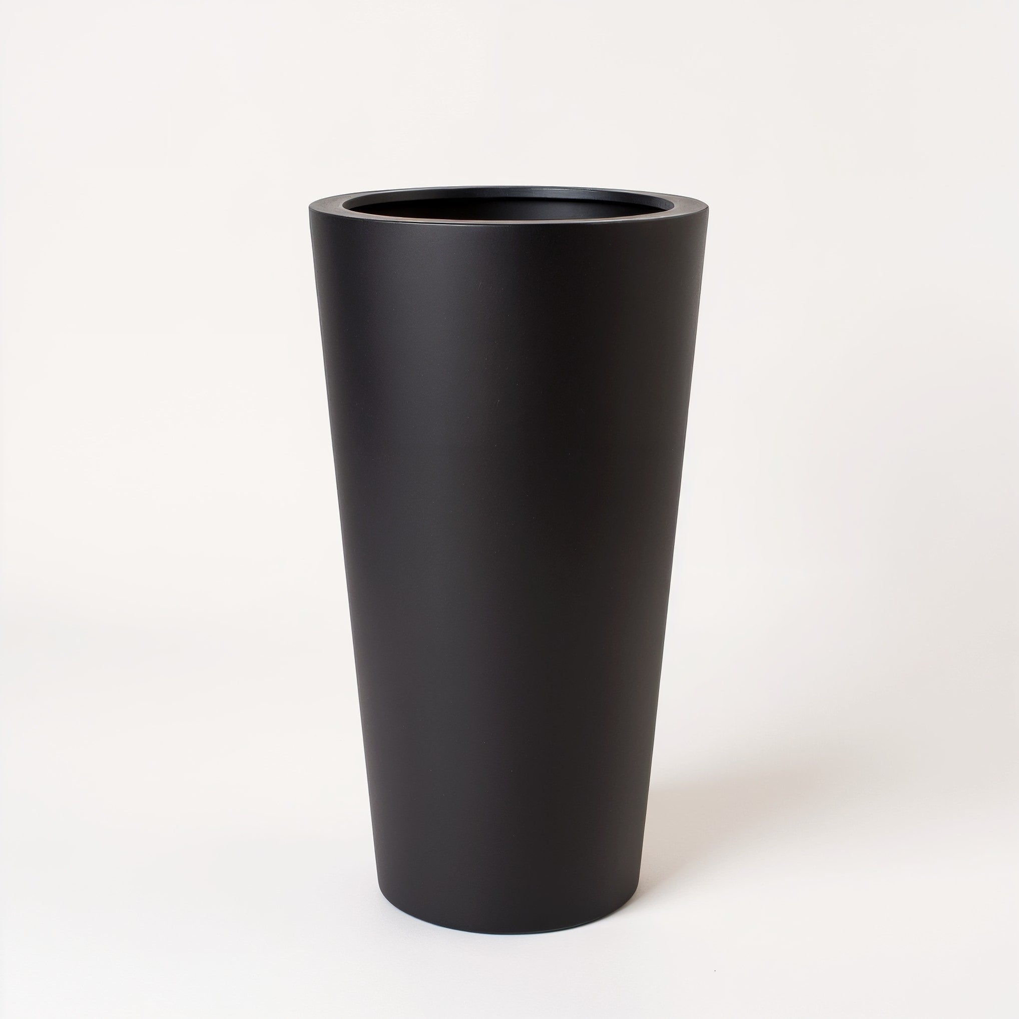 Vensioshop Matte Black Tall Ceramic Planter — side profile displaying height and silhouette