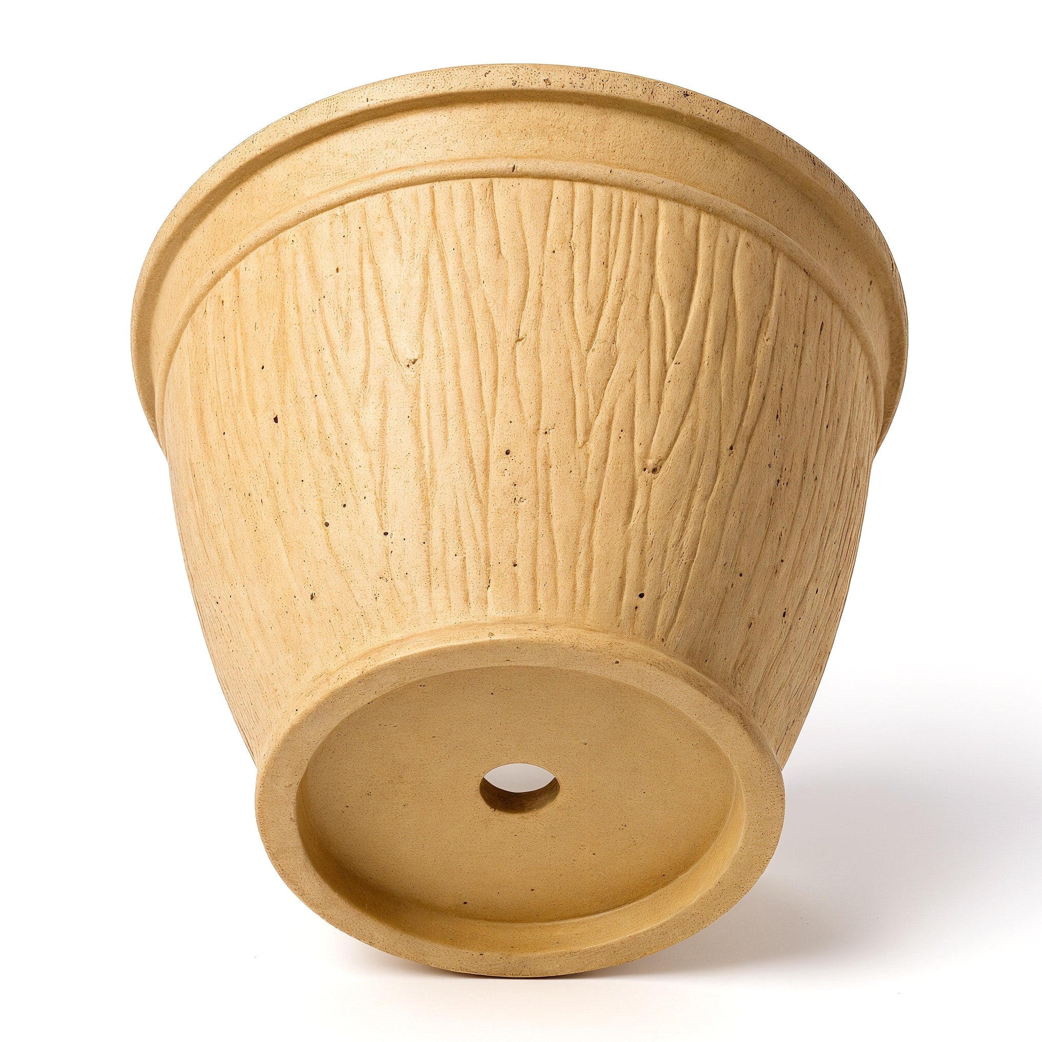 Vensioshop Sandstone Textured Ceramic Planter — view of the base showing underside and drainage hole