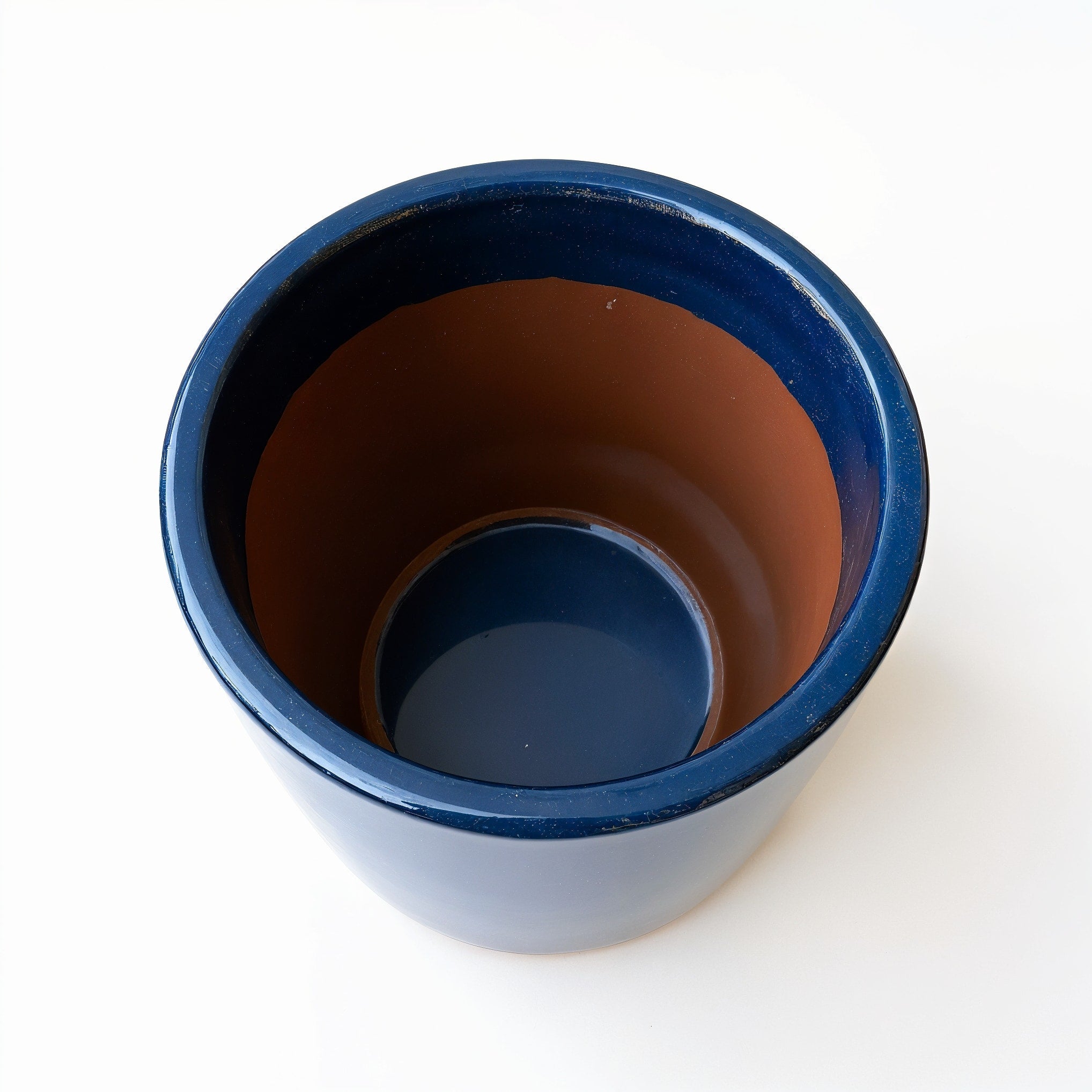 Vensioshop Midnight Blue Cylinder Ceramic Planter — top-down view into the planter showing the interior
