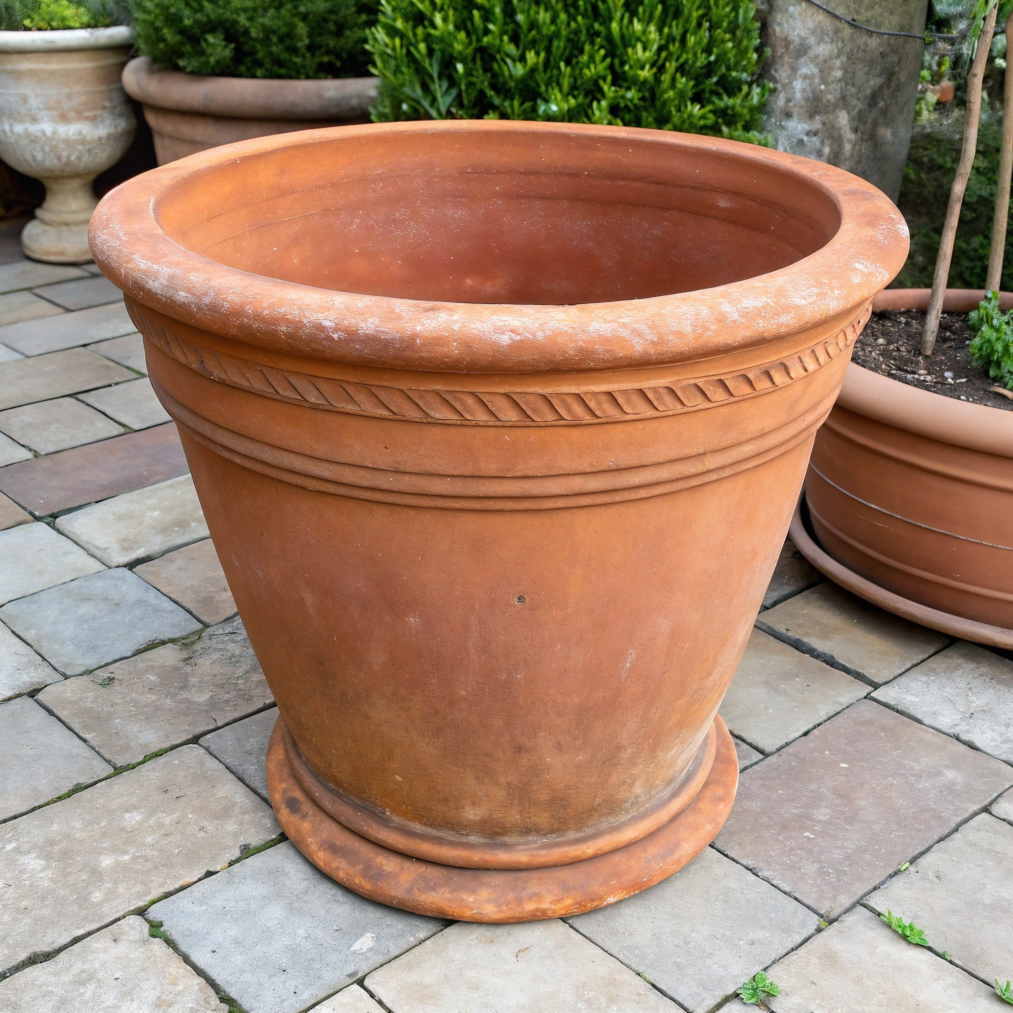 Vensioshop Rustic Italian Terracotta Planter — three-quarter front view showing the classic shape and rustic finish