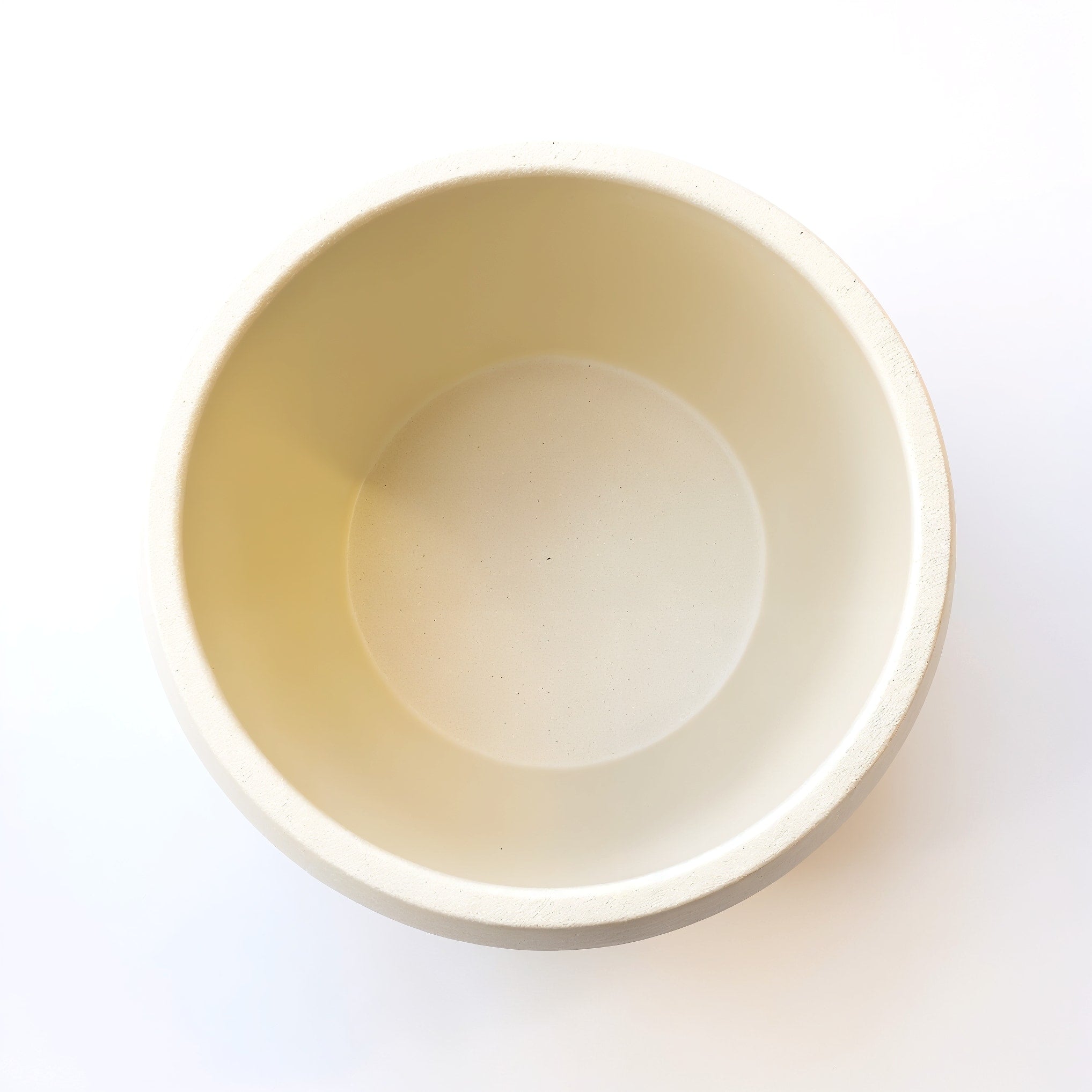Vensioshop Ivory Ceramic Planter — top-down view into the planter's opening showing interior