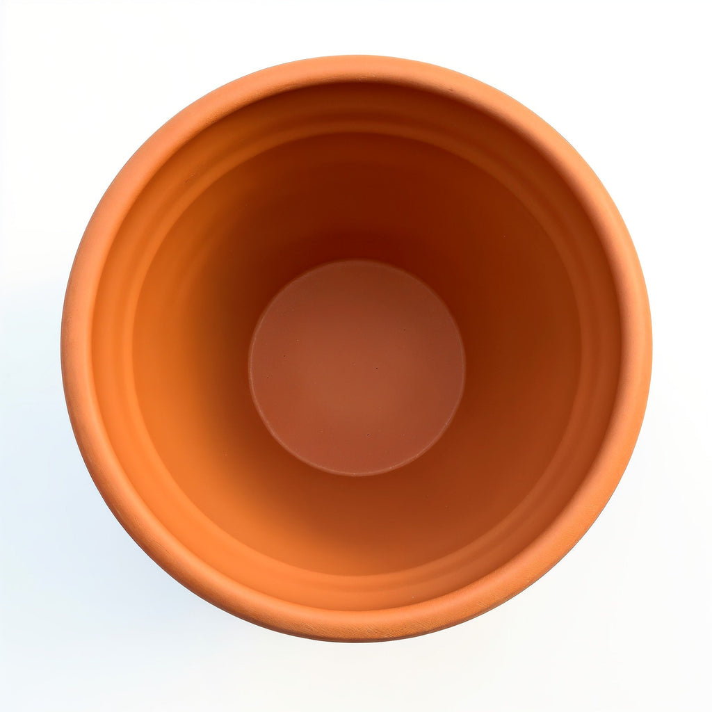 Vensioshop Large Smooth Terracotta Planter — top-down view into the planter's opening, showing the interior.